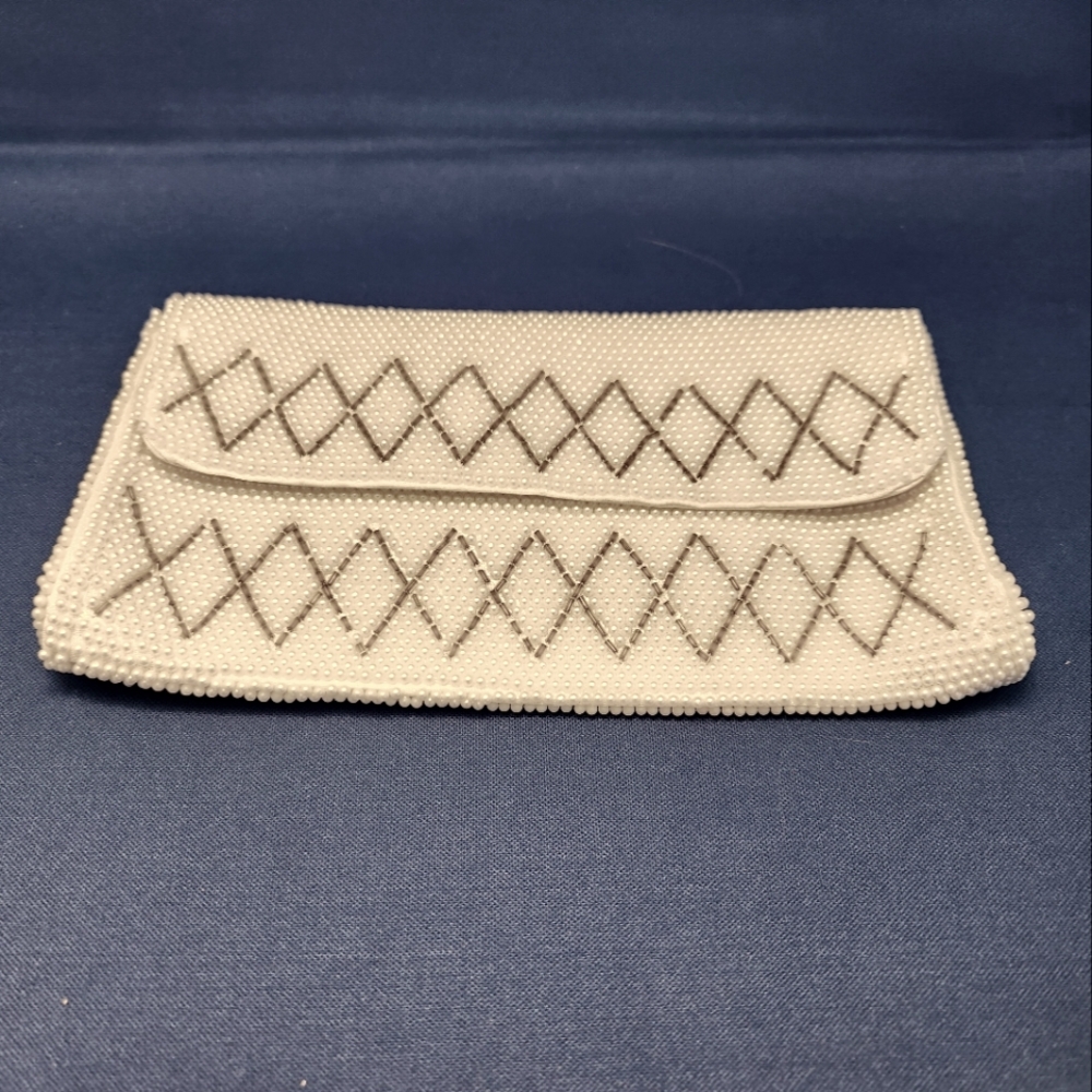 Cream Clutch with Decorative Stitching